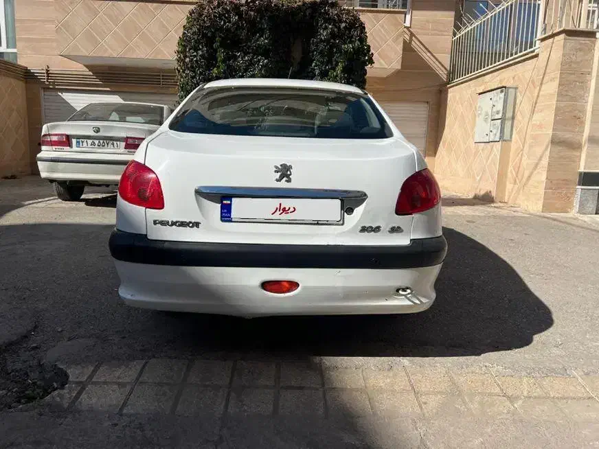 پژو ۲۰۶ صندوق دار v8 - 1395