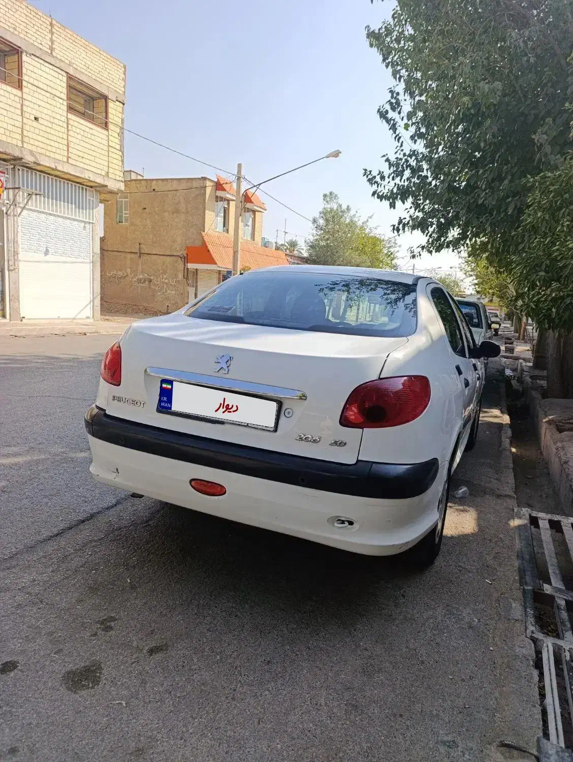 پژو ۲۰۶ صندوق دار v8 - 1396