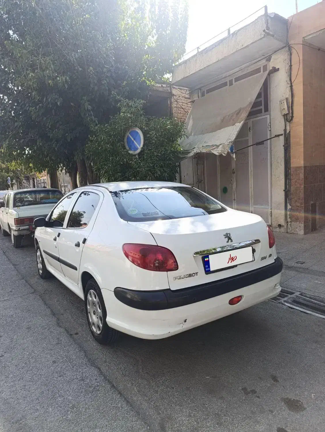 پژو ۲۰۶ صندوق دار v8 - 1396