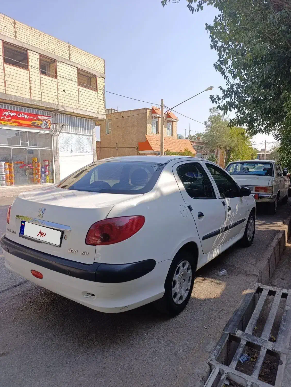 پژو ۲۰۶ صندوق دار v8 - 1396