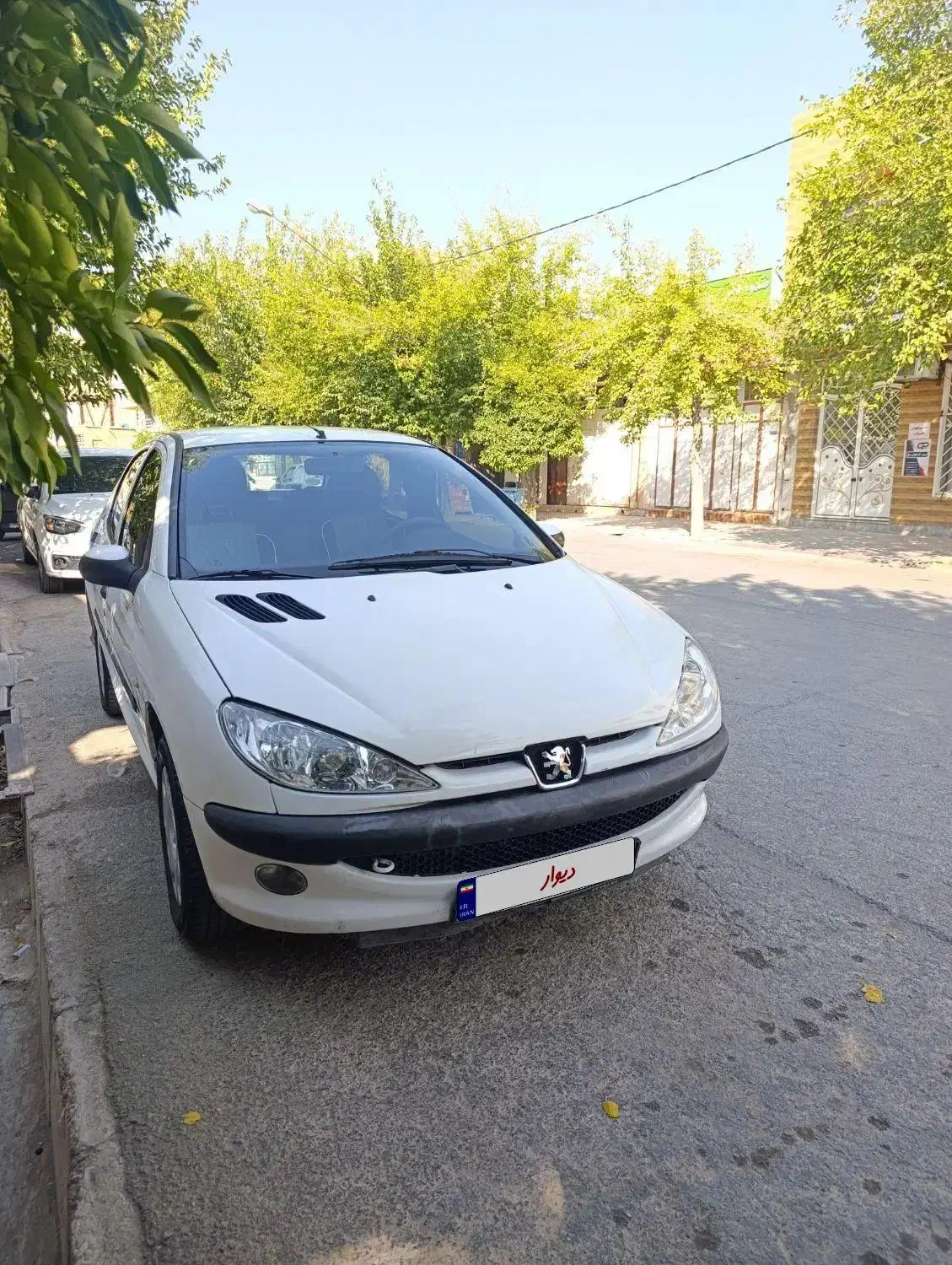 پژو ۲۰۶ صندوق دار v8 - 1396