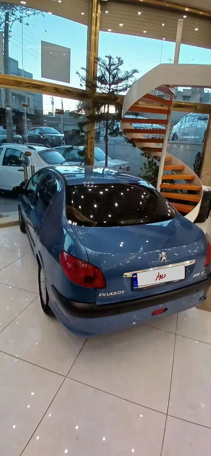 پژو ۲۰۶ صندوق دار v8 - 1396