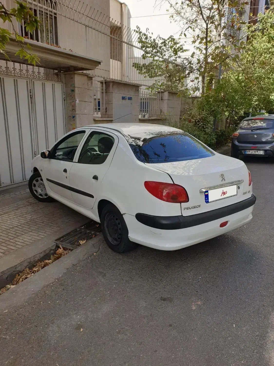 پژو ۲۰۶ صندوق دار v8 - 1391