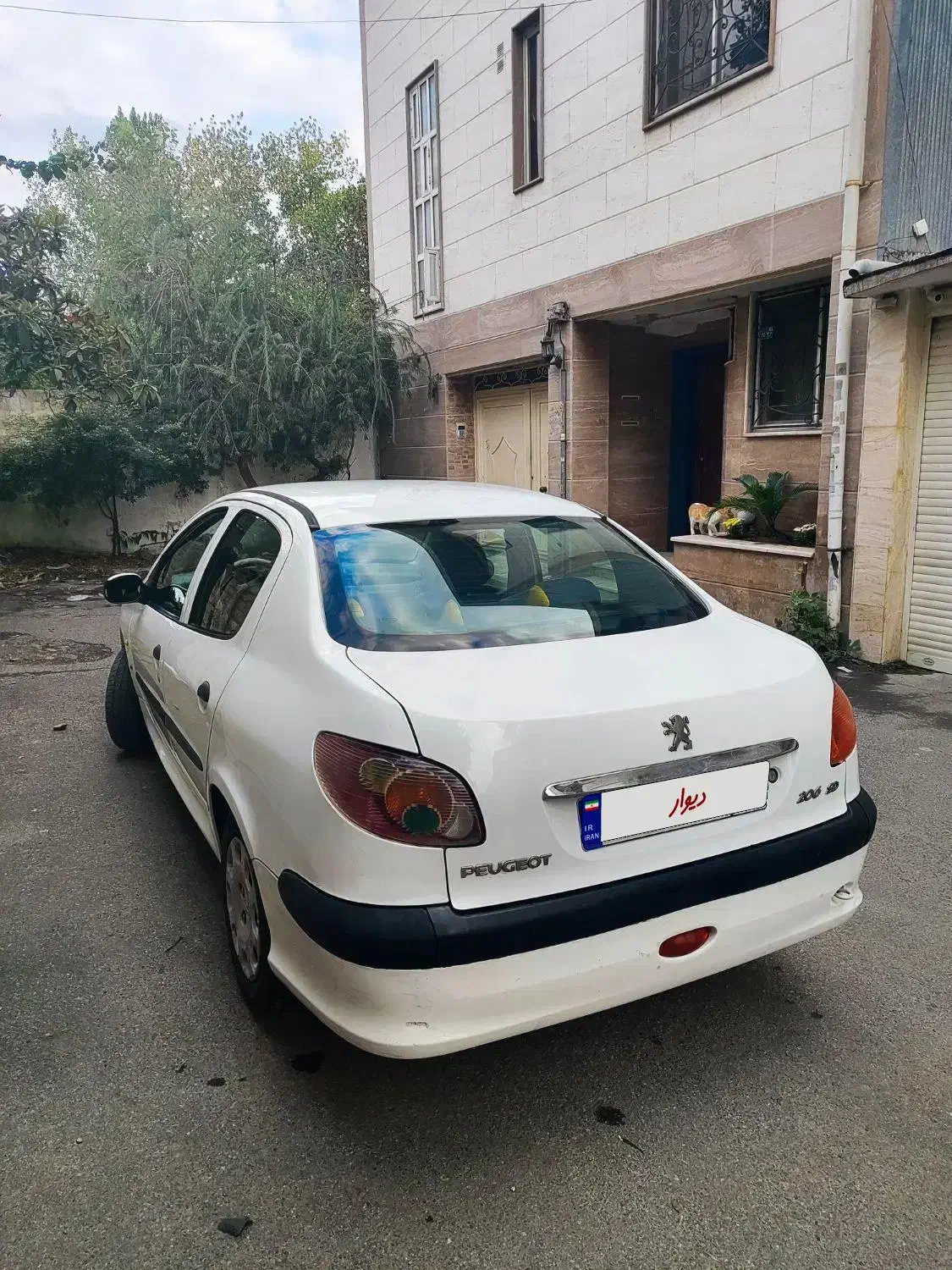 پژو ۲۰۶ صندوق دار v8 - 1394