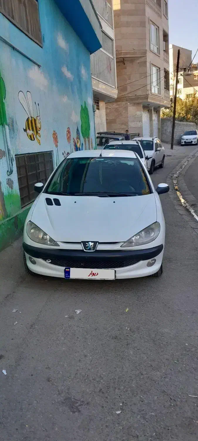 پژو ۲۰۶ صندوق دار v8 - 1395