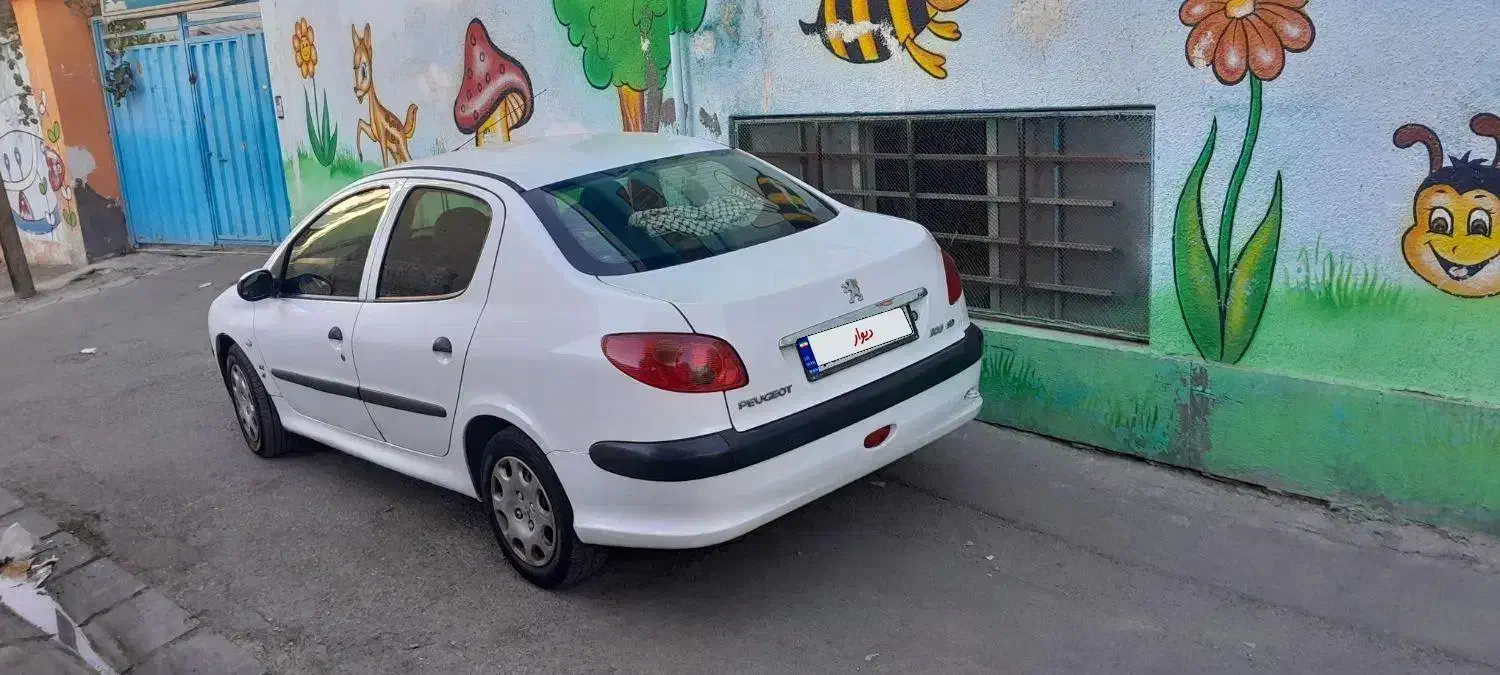 پژو ۲۰۶ صندوق دار v8 - 1395