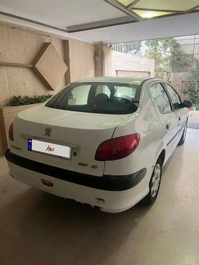 پژو ۲۰۶ صندوق دار v19 - 1389