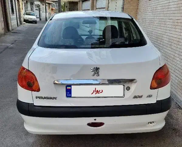 پژو ۲۰۶ صندوق دار v8 - 1394