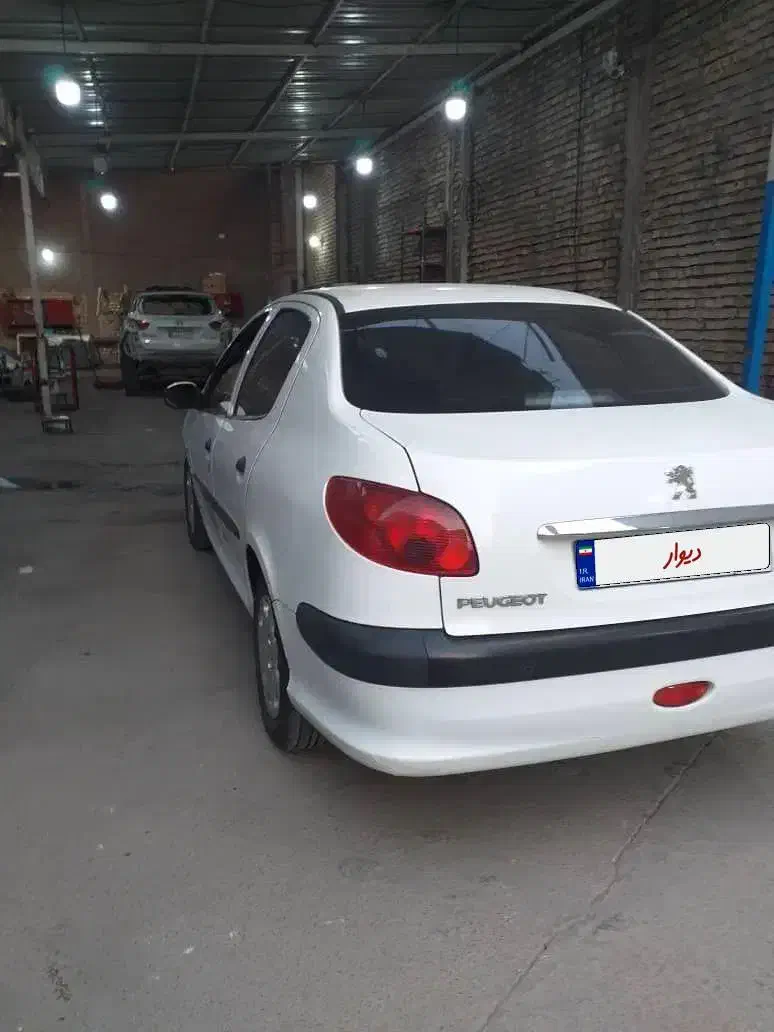 پژو ۲۰۶ صندوق دار v8 - 1397