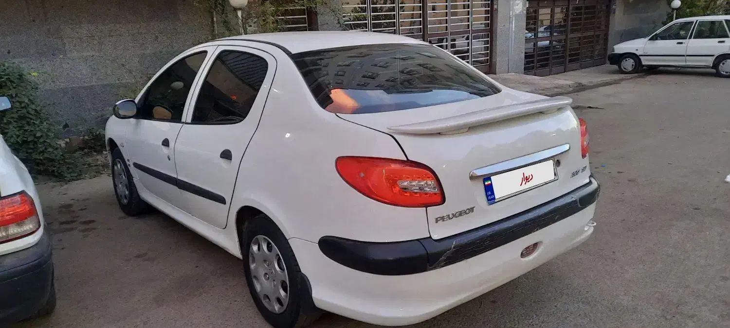 پژو ۲۰۶ صندوق دار v8 - 1396