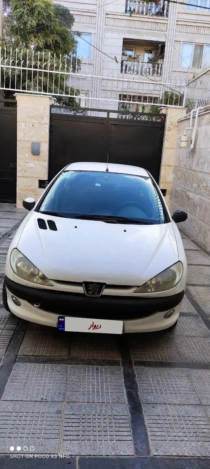 پژو ۲۰۶ صندوق دار v8 - 1394