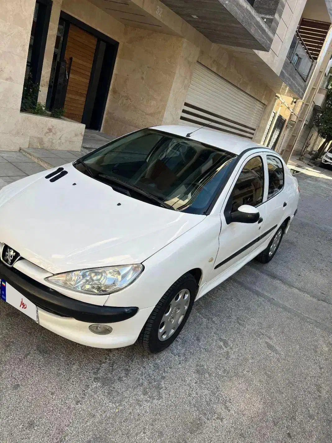 پژو ۲۰۶ صندوق دار v8 - 1394