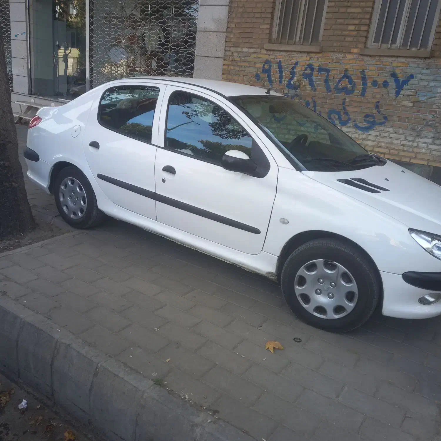 پژو ۲۰۶ صندوق دار v8 - 1396