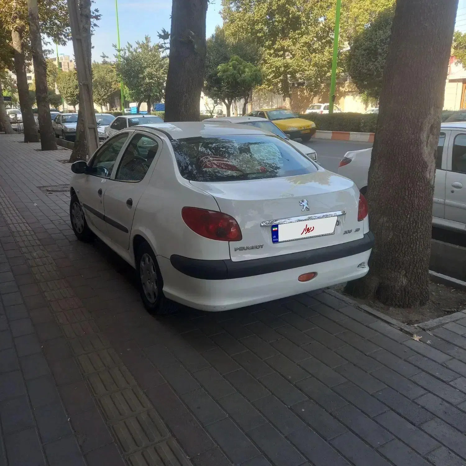 پژو ۲۰۶ صندوق دار v8 - 1396