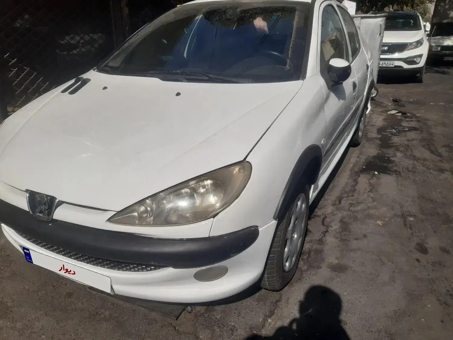 پژو ۲۰۶ صندوق دار v8 - 1391
