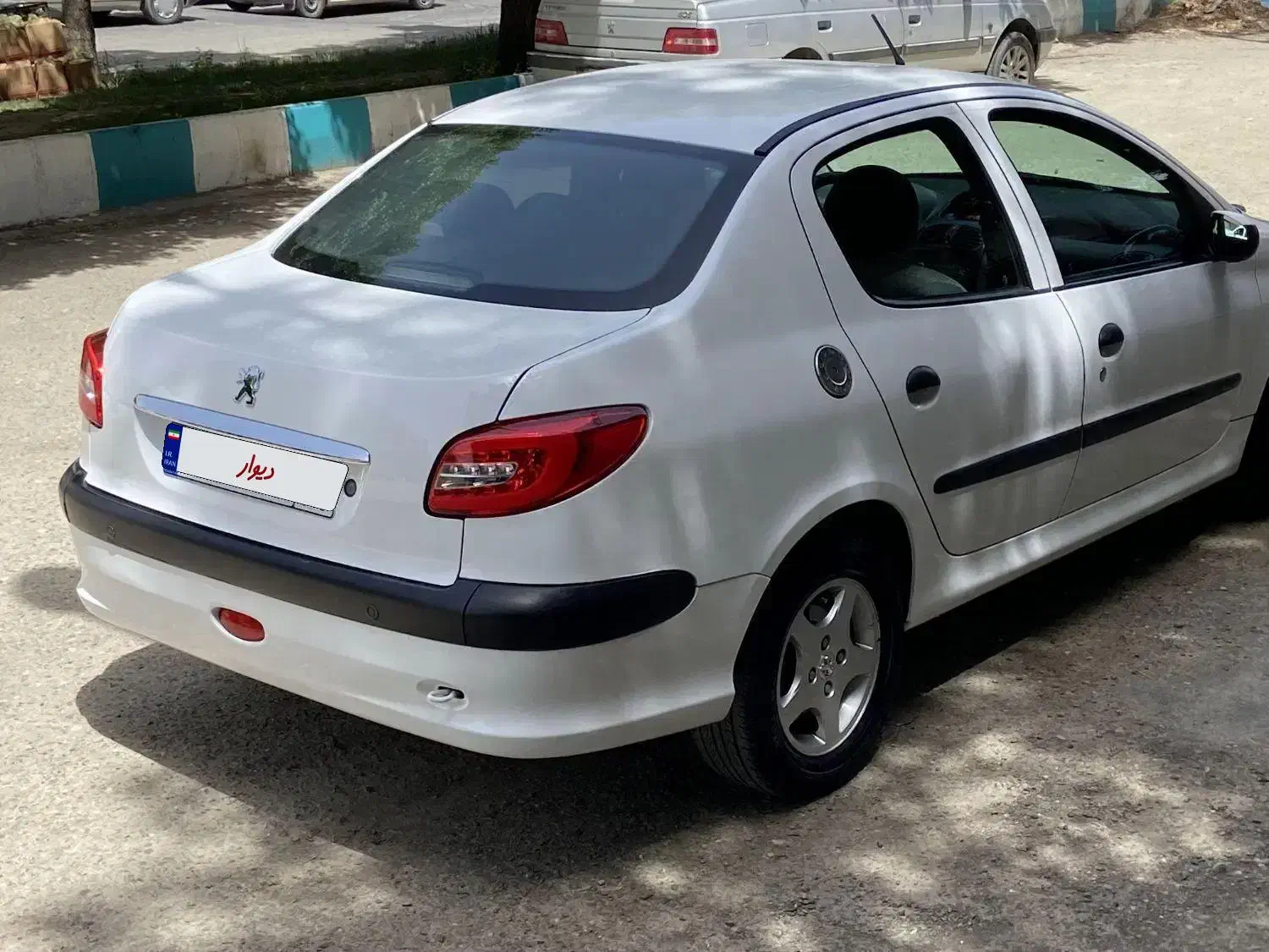 پژو ۲۰۶ صندوق دار v8 - 1397