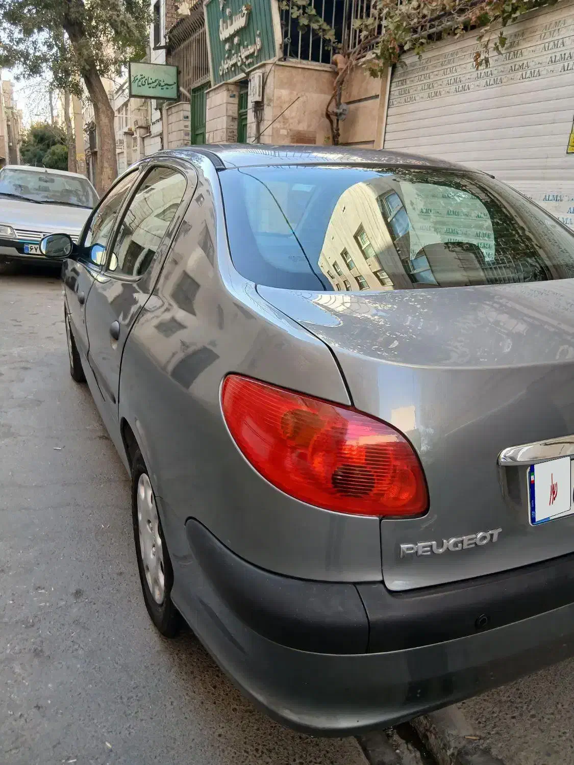 پژو ۲۰۶ صندوق دار v8 - 1394
