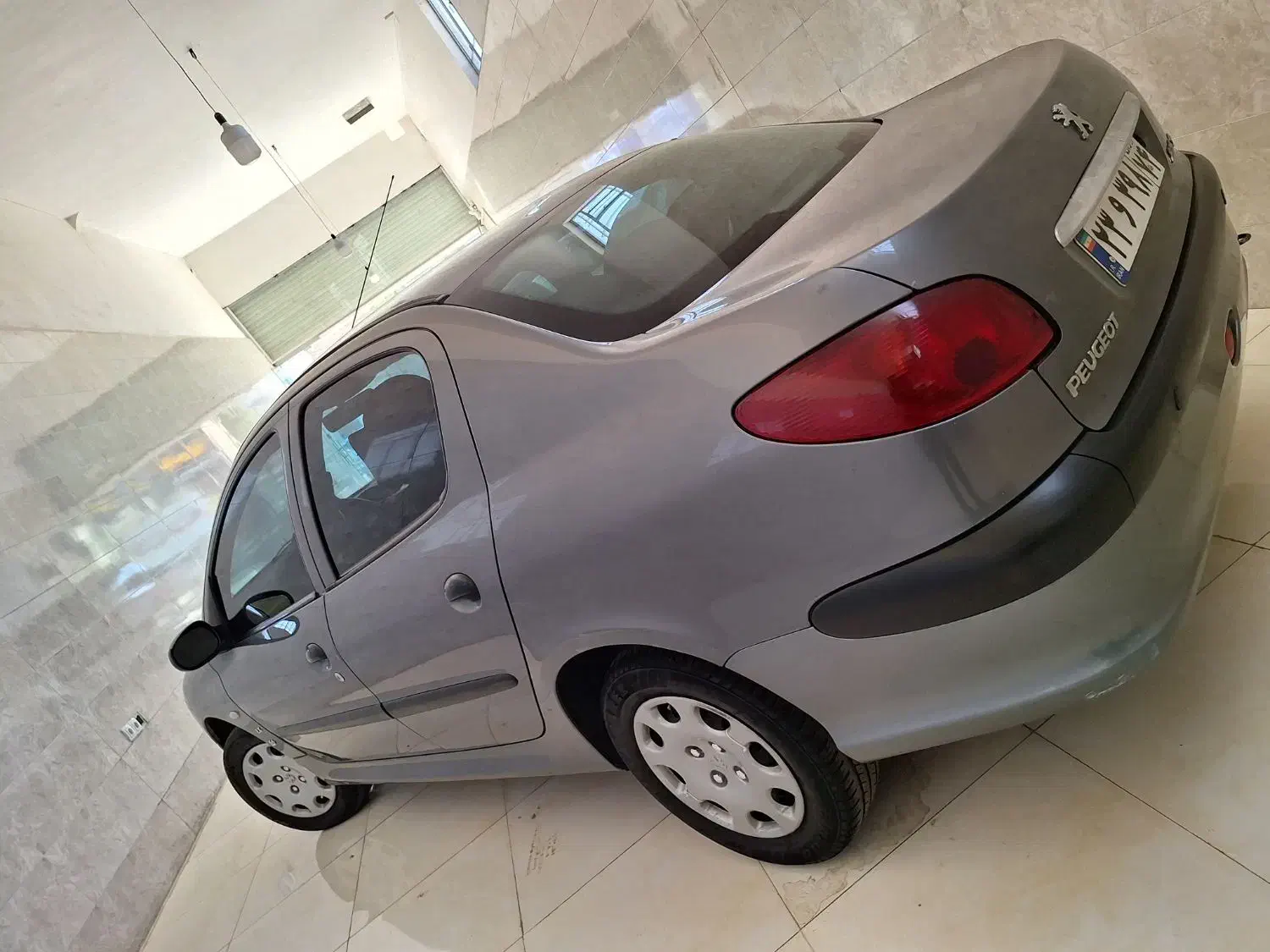 پژو ۲۰۶ صندوق دار v8 - 1391