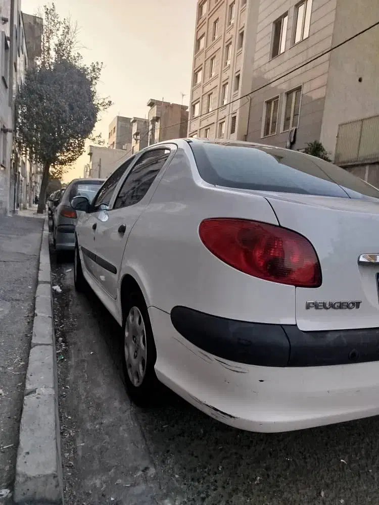 پژو ۲۰۶ صندوق دار v8 - 1396