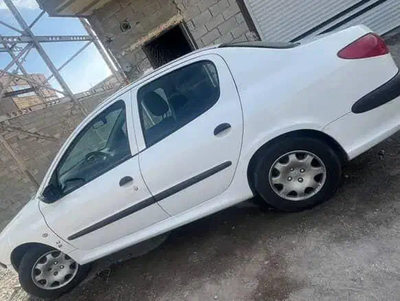 پژو ۲۰۶ صندوق دار v8 - 1396