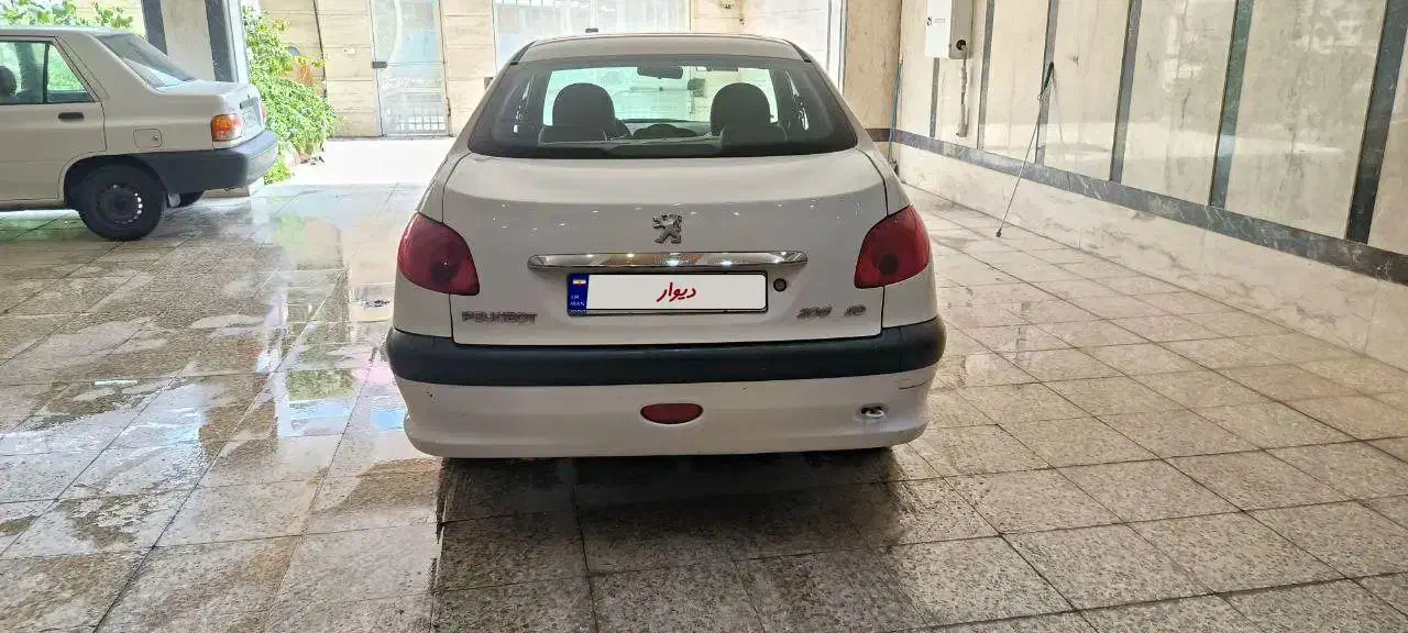 پژو ۲۰۶ صندوق دار v8 - 1395