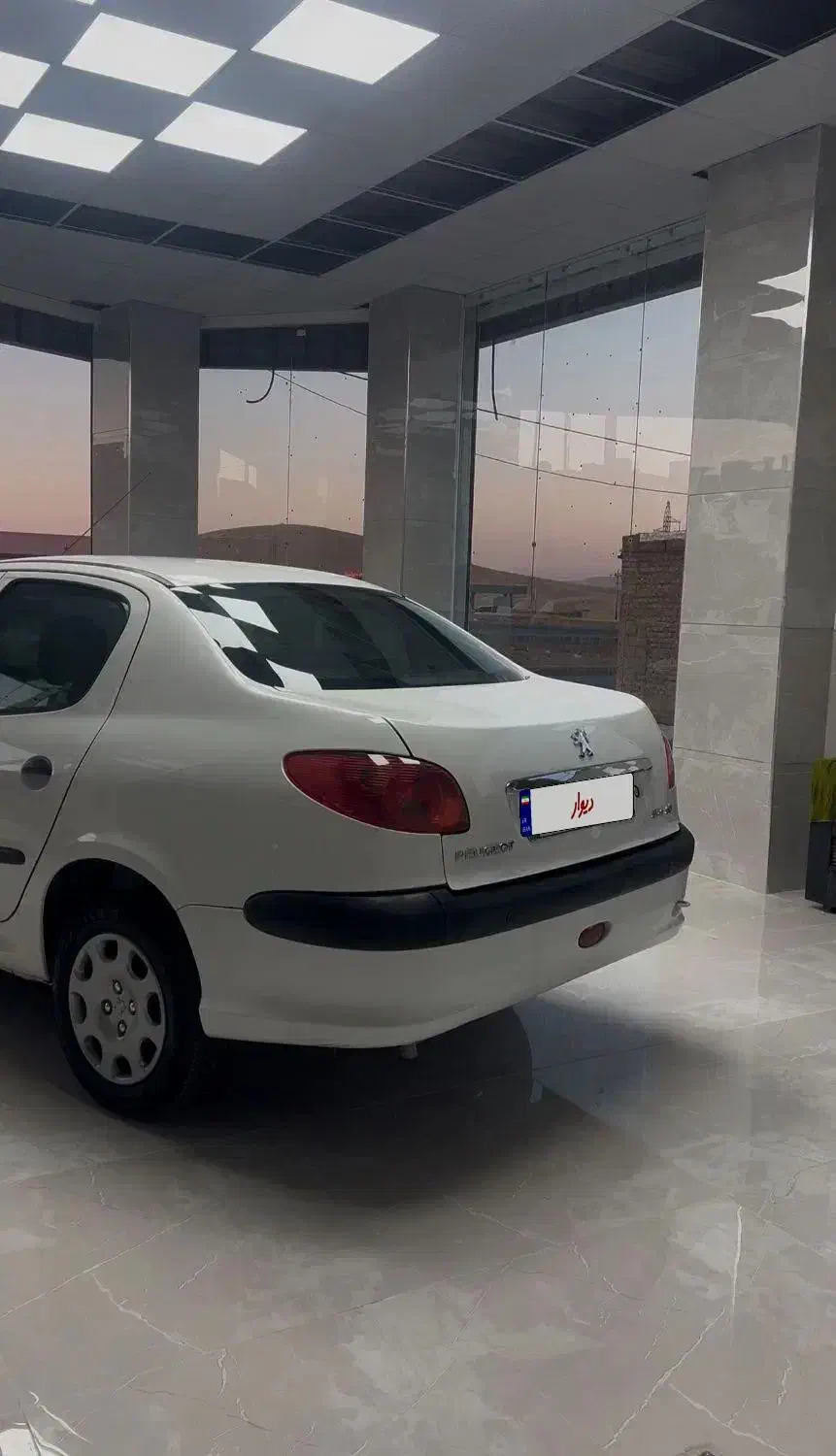 پژو ۲۰۶ صندوق دار v8 - 1394