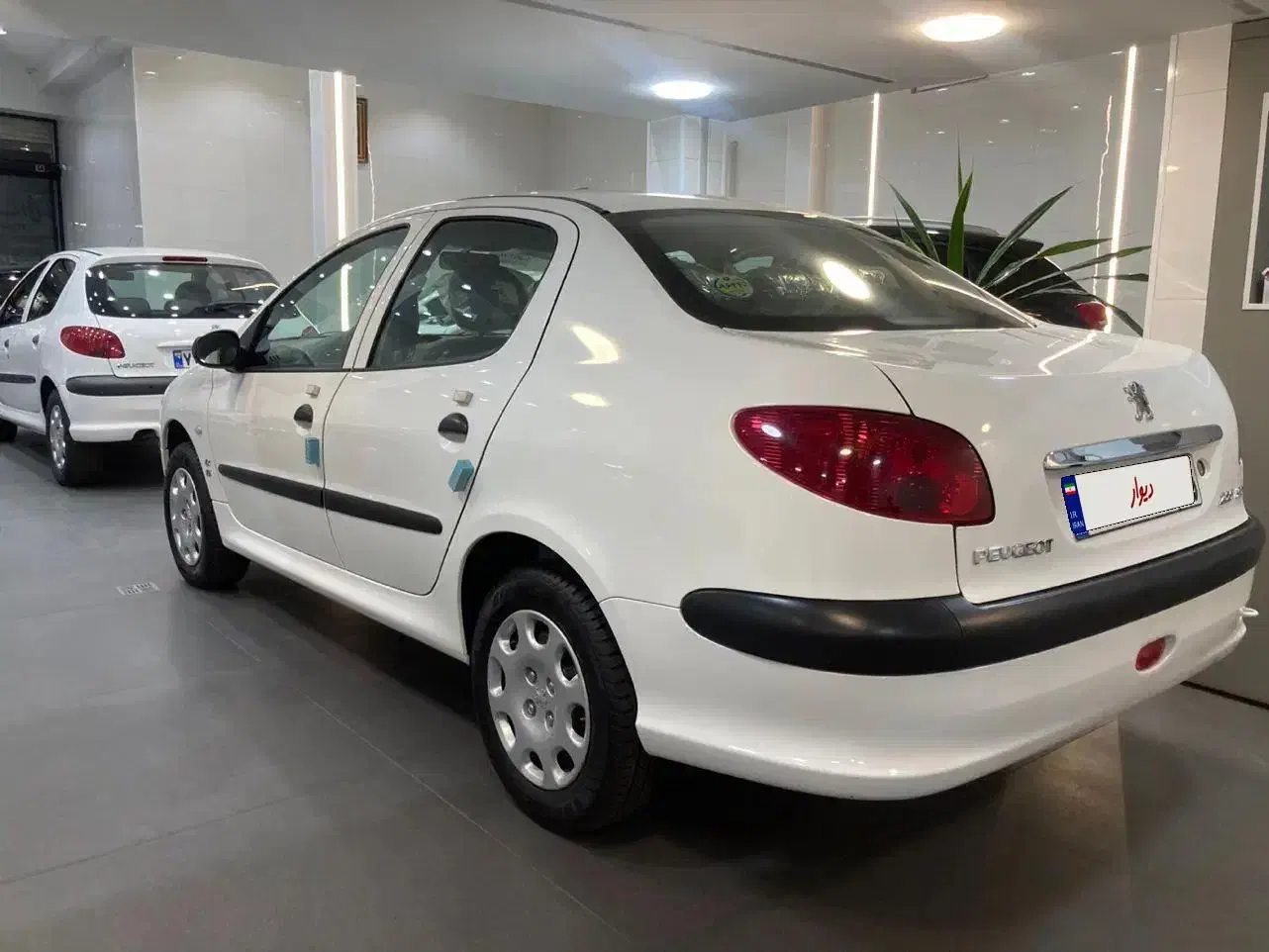 پژو ۲۰۶ صندوق دار v8 - 1399