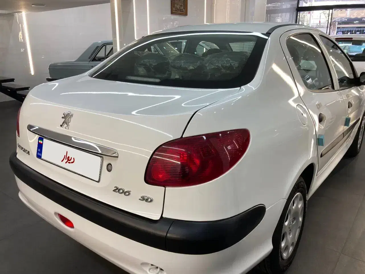 پژو ۲۰۶ صندوق دار v8 - 1399