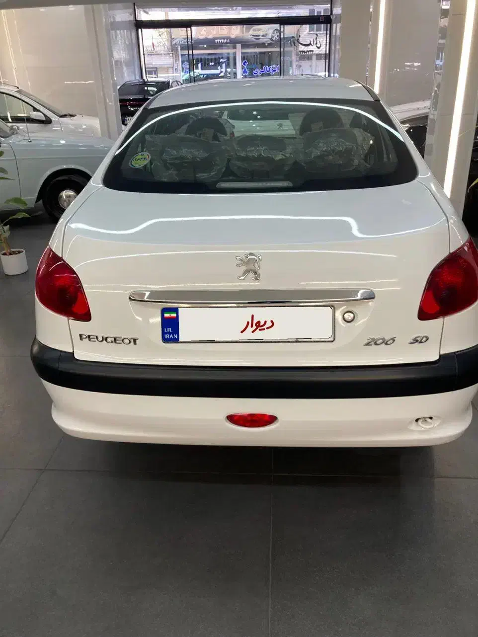پژو ۲۰۶ صندوق دار v8 - 1399