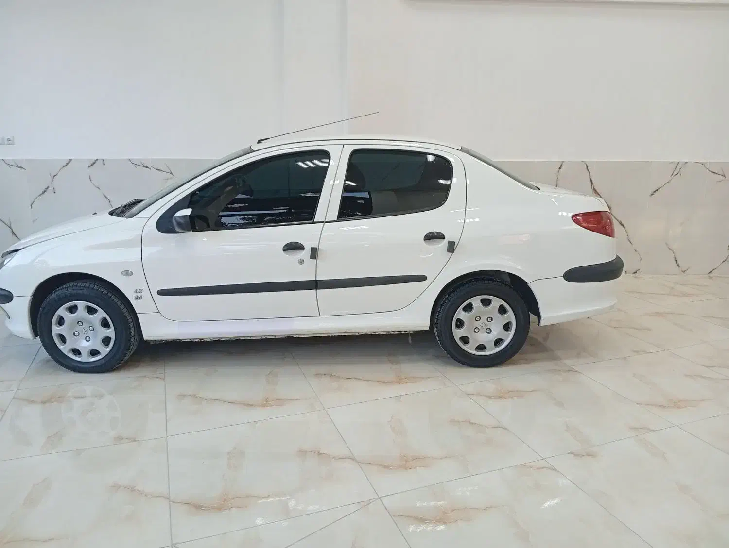 پژو ۲۰۶ صندوق دار v8 - 1395