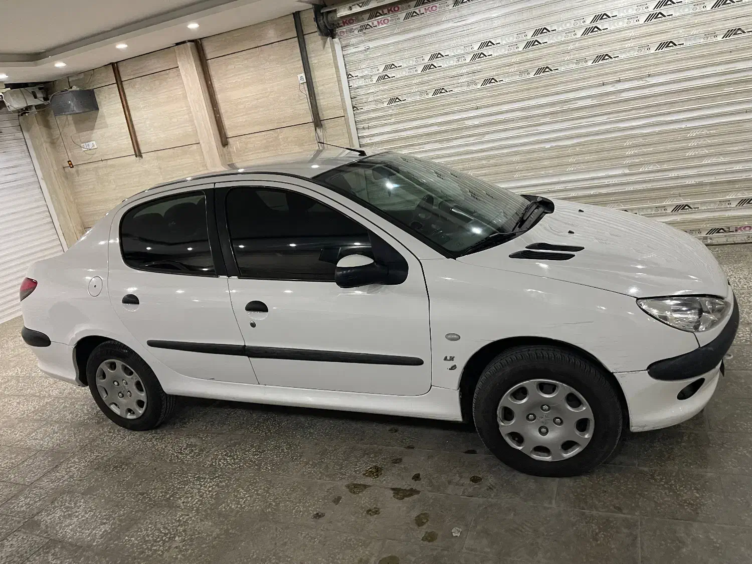 پژو ۲۰۶ صندوق دار v8 - 1390
