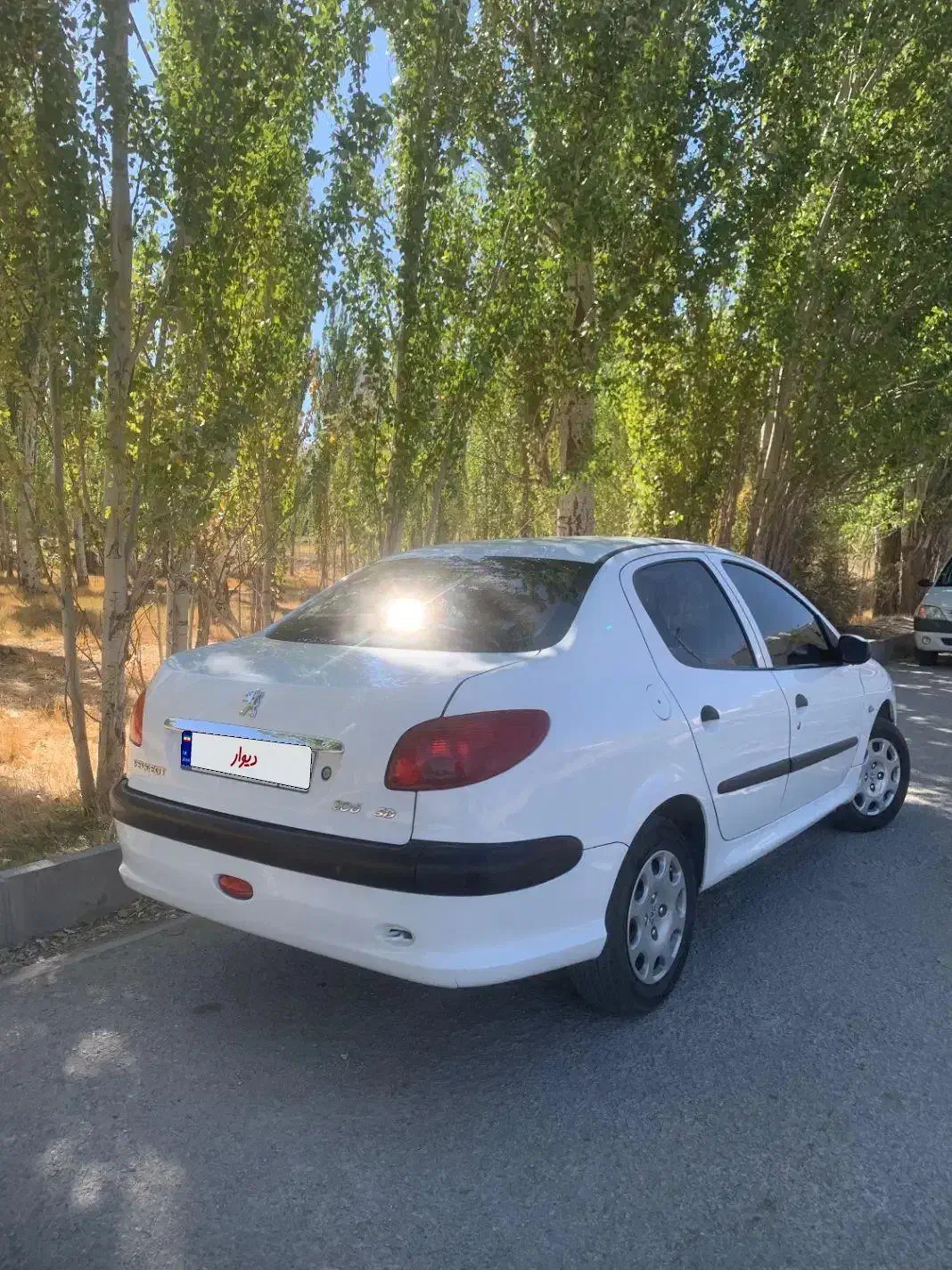 پژو ۲۰۶ صندوق دار v8 - 1398