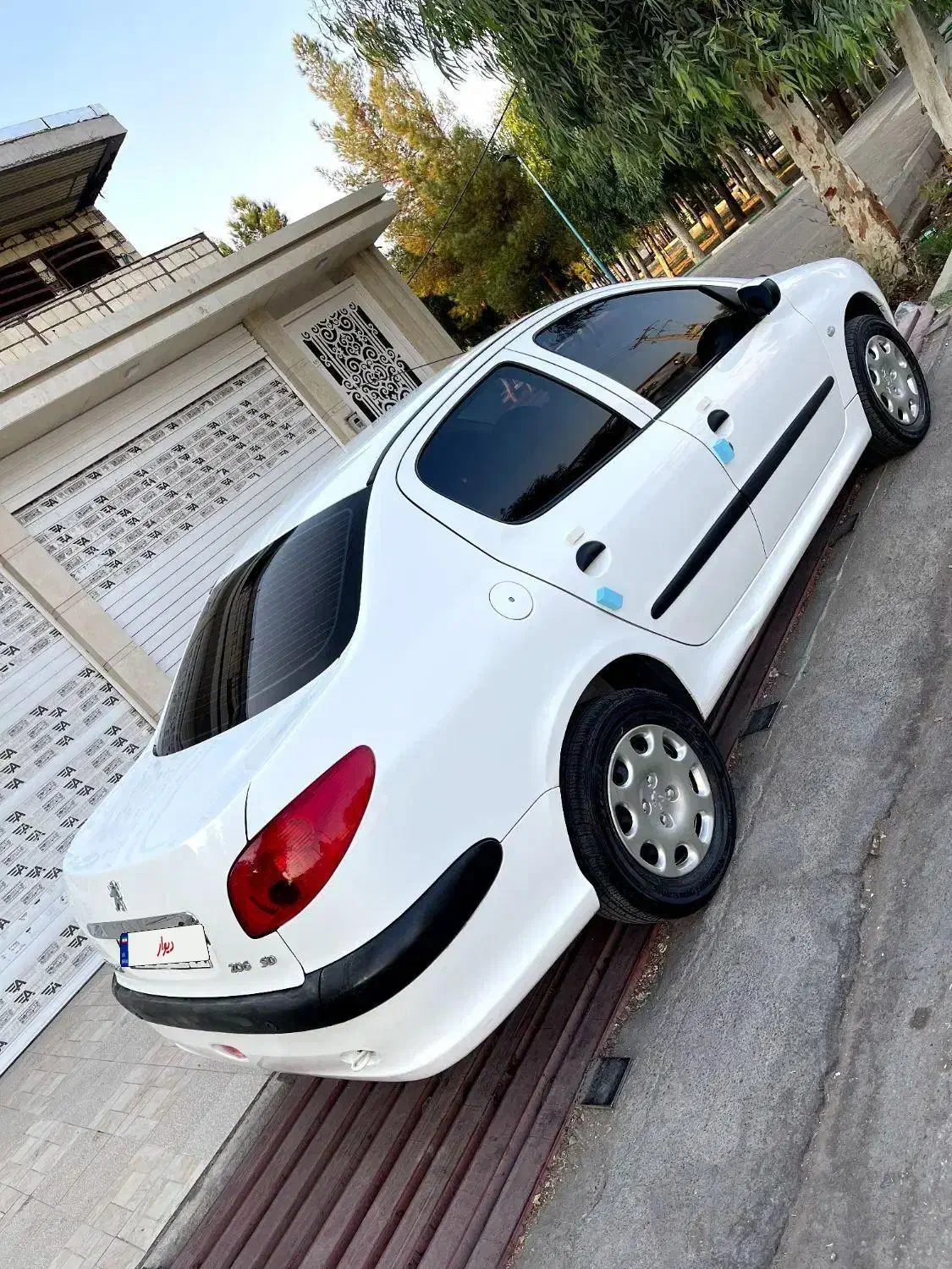 پژو ۲۰۶ صندوق دار v8 - 1395