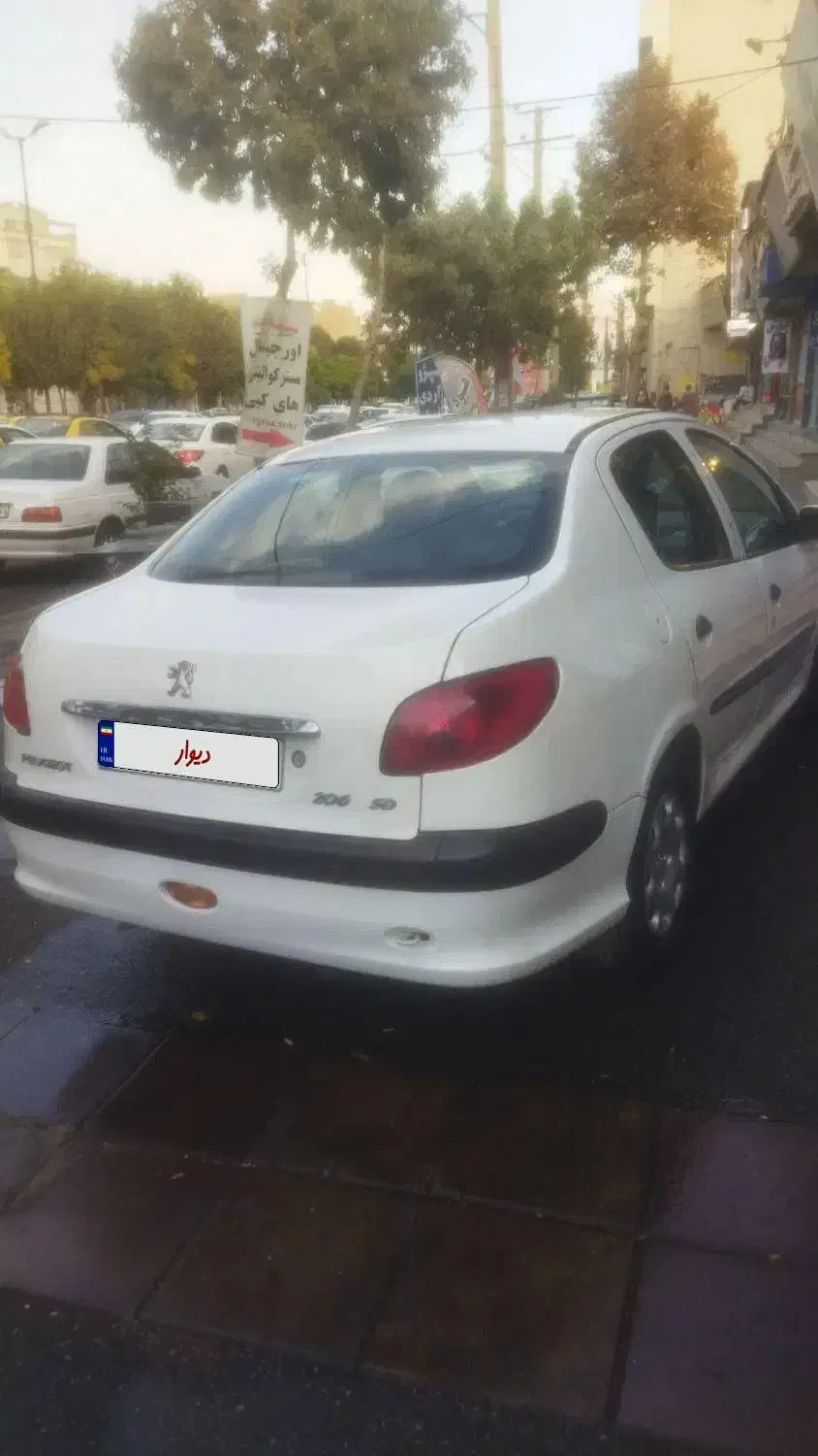 پژو ۲۰۶ صندوق دار v8 - 1394