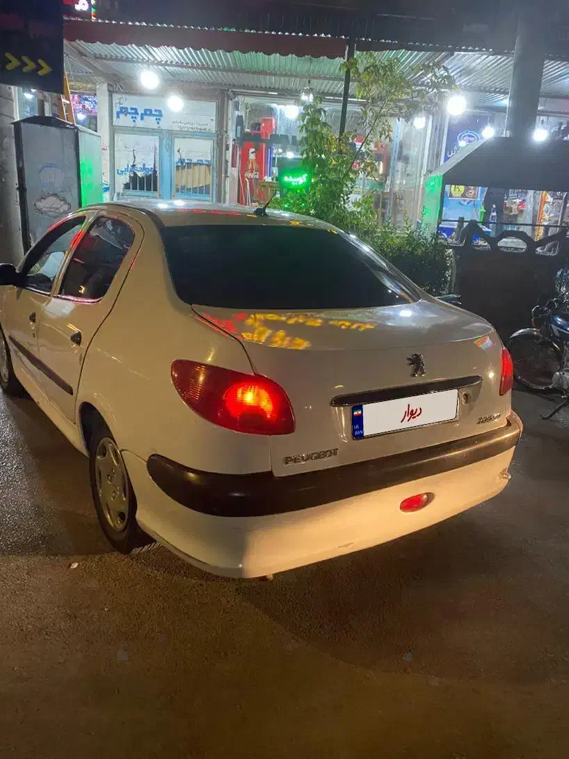 پژو ۲۰۶ صندوق دار v8 - 1391
