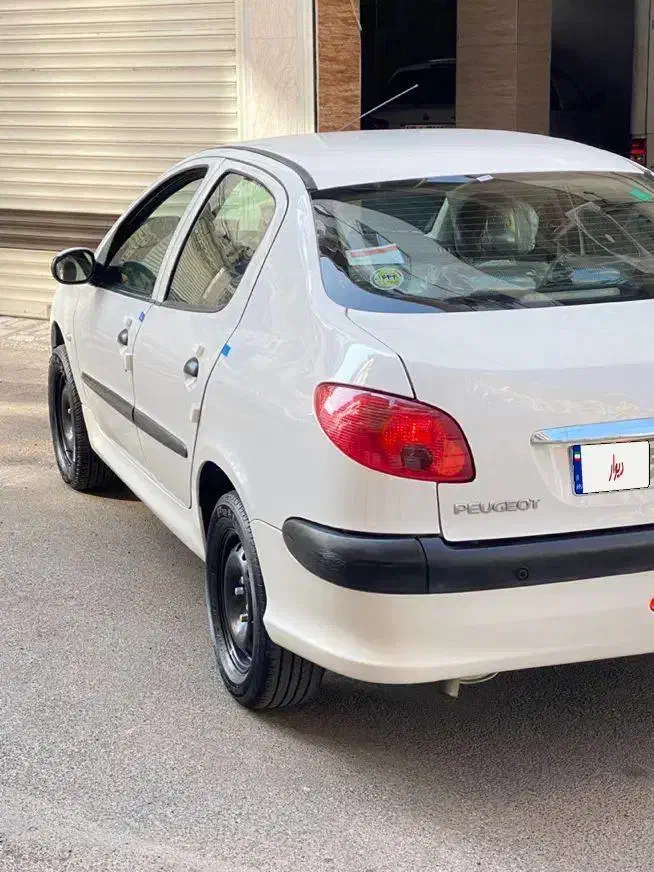 پژو ۲۰۶ صندوق دار v8 - 1395