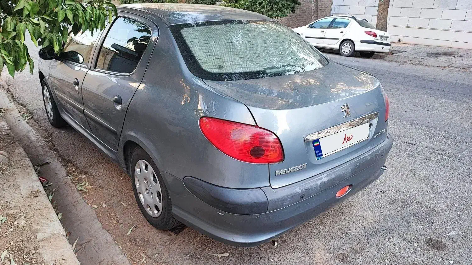 پژو ۲۰۶ صندوق دار v8 - 1395