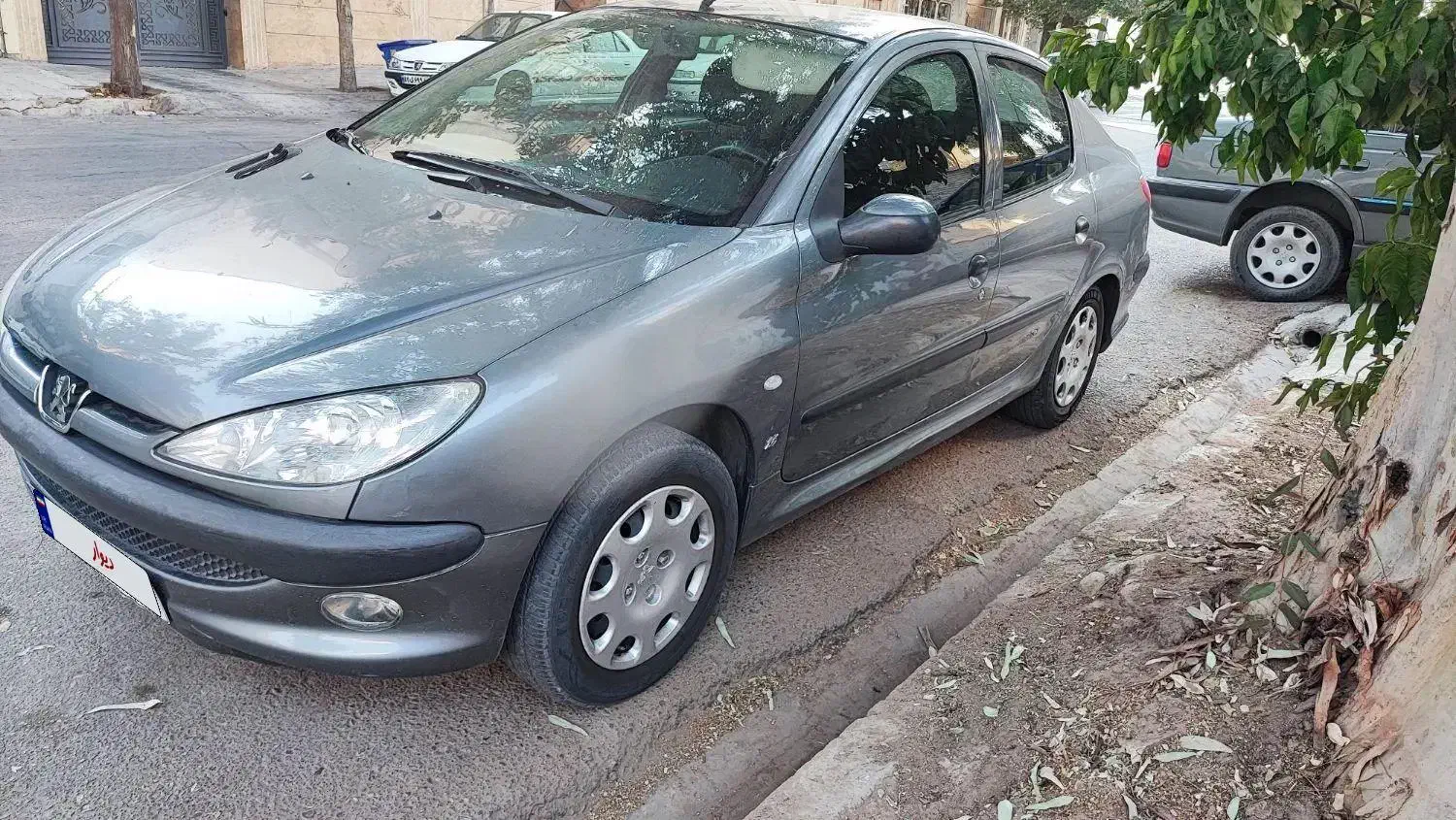 پژو ۲۰۶ صندوق دار v8 - 1395