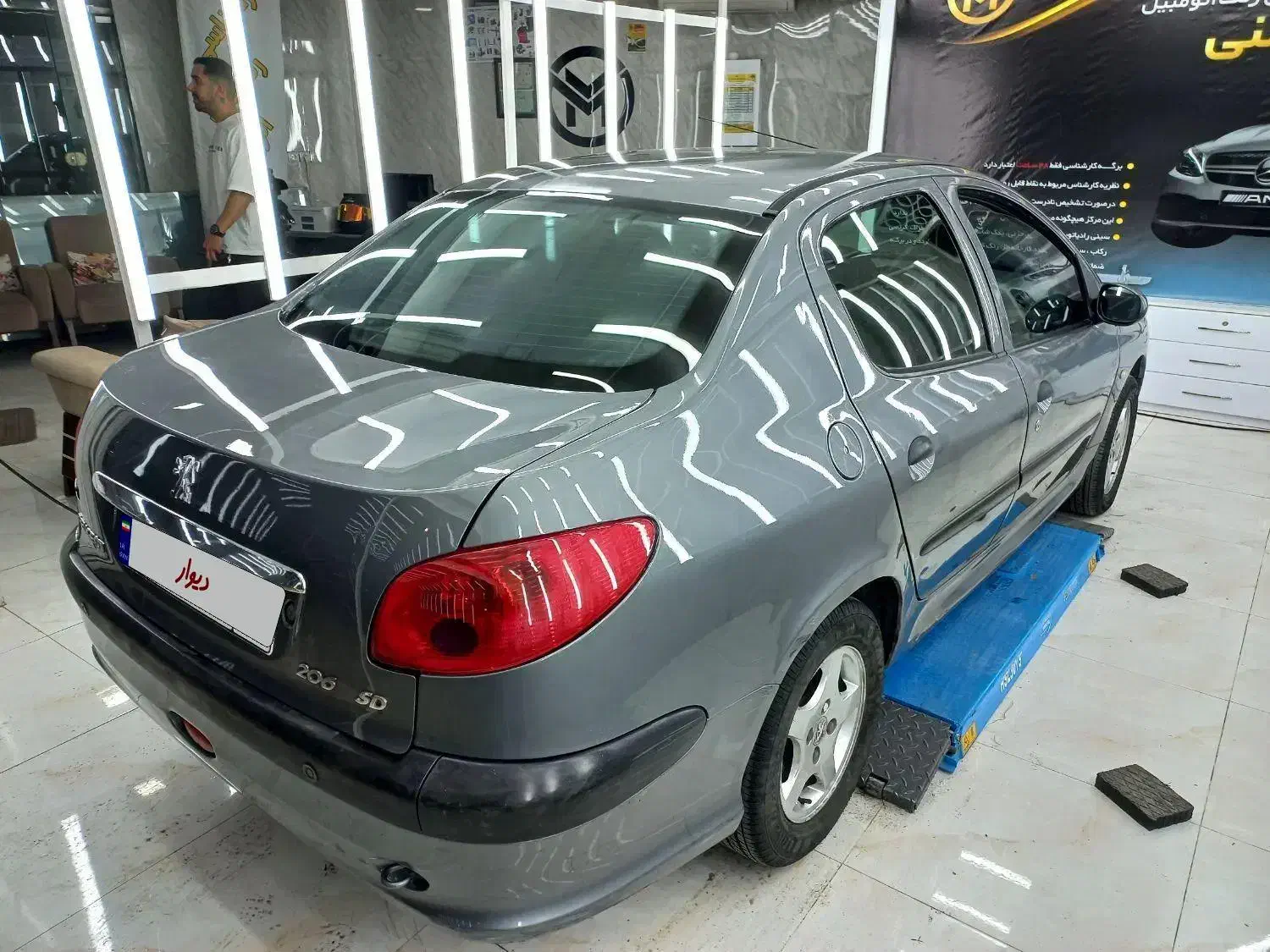 پژو ۲۰۶ صندوق دار v8 - 1394