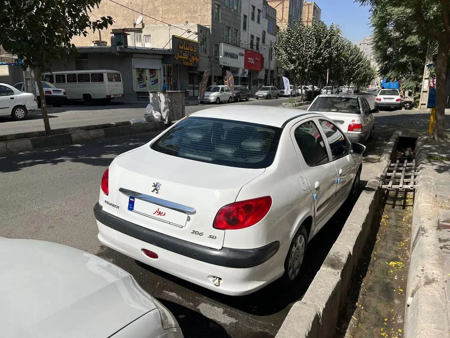 پژو ۲۰۶ صندوق دار v8 - 1396