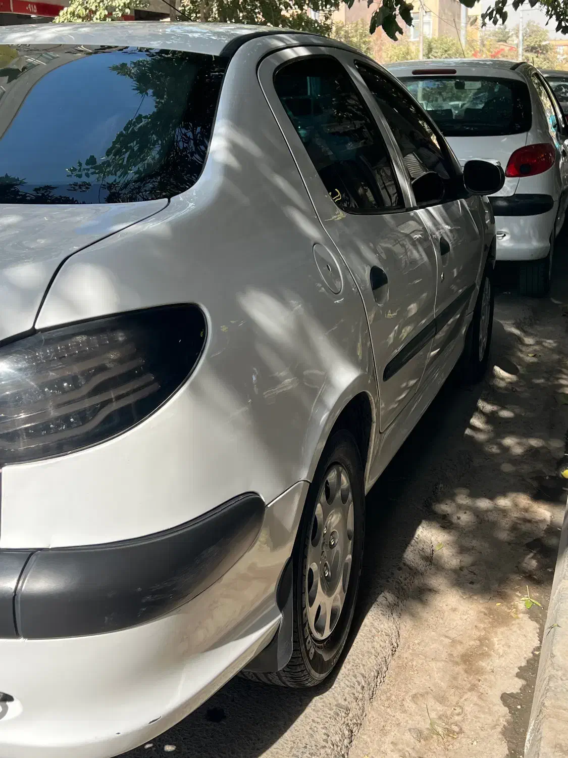 پژو ۲۰۶ صندوق دار v8 - 1394
