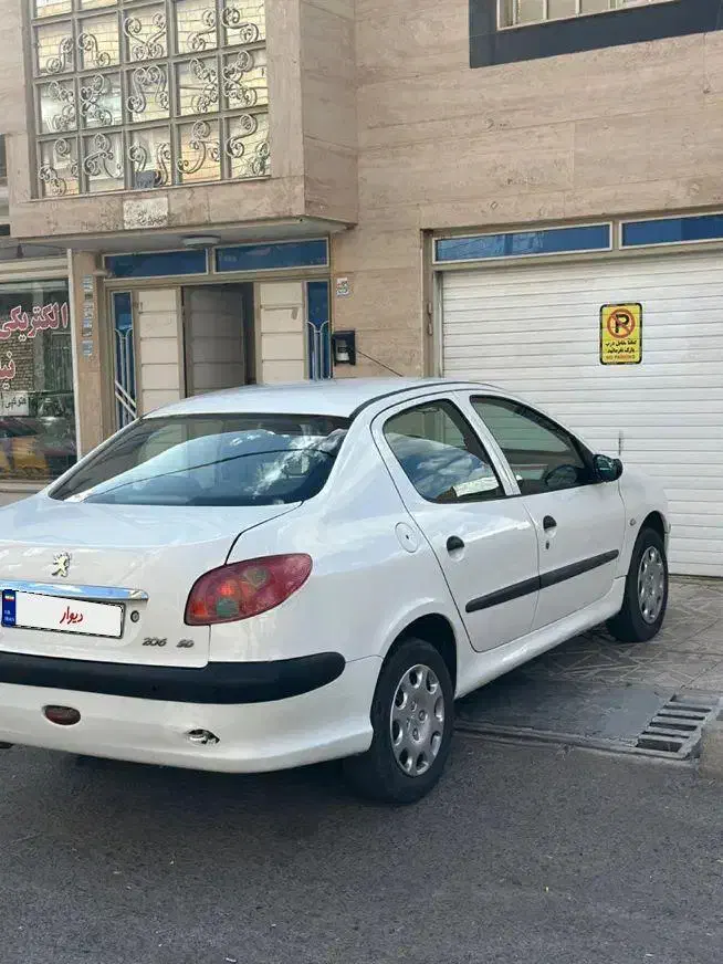 پژو ۲۰۶ صندوق دار v8 - 1394