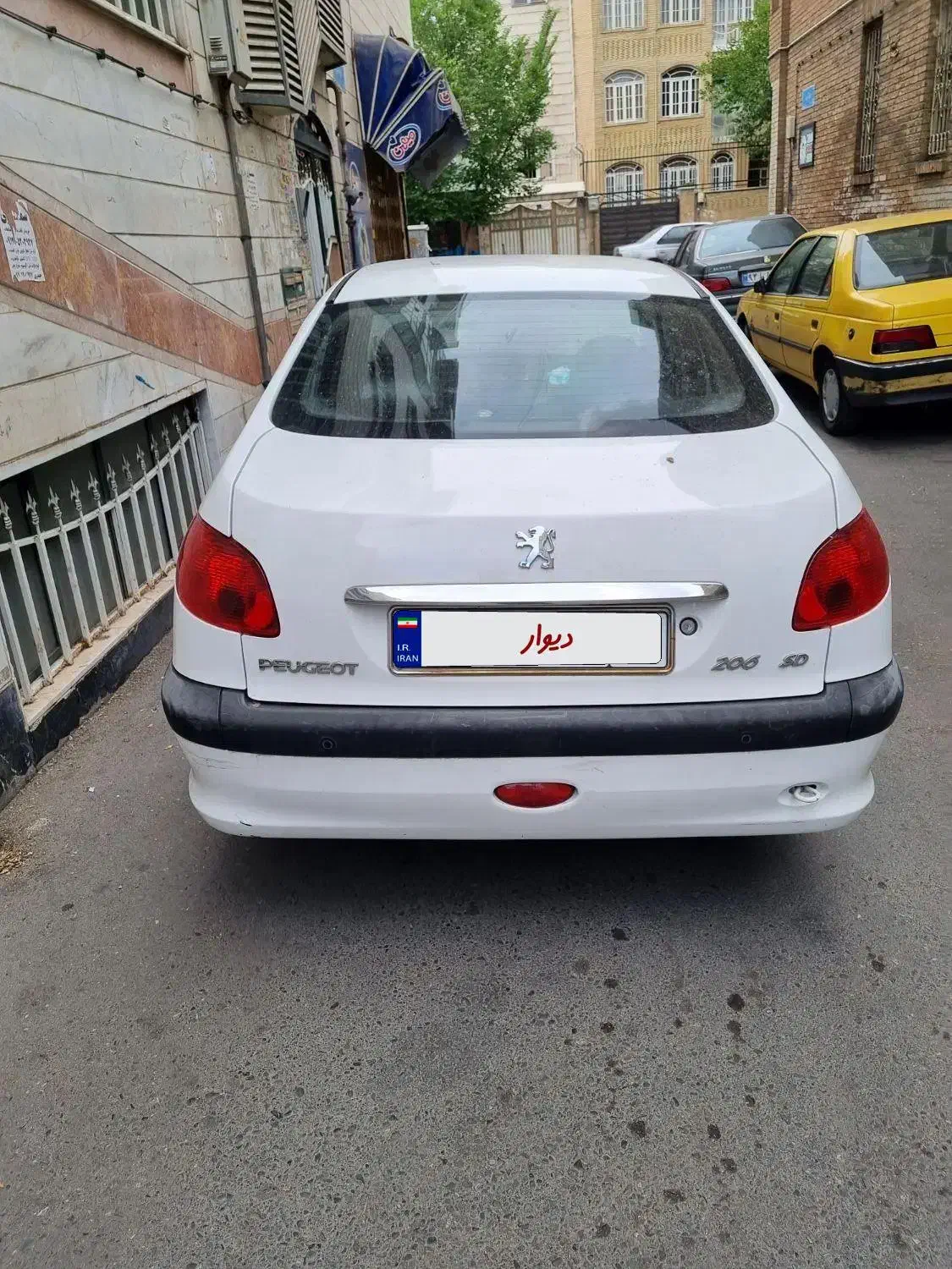 پژو ۲۰۶ صندوق دار v8 - 1397