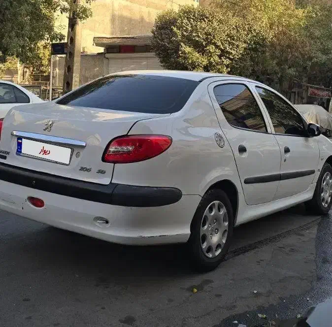 پژو ۲۰۶ صندوق دار v8 - 1395