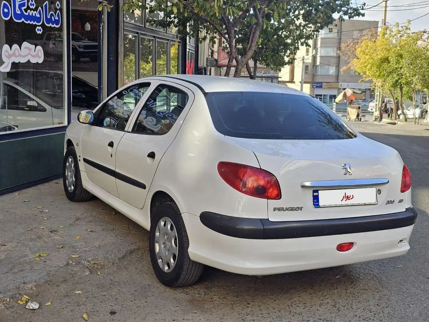 پژو ۲۰۶ صندوق دار v8 - 1397