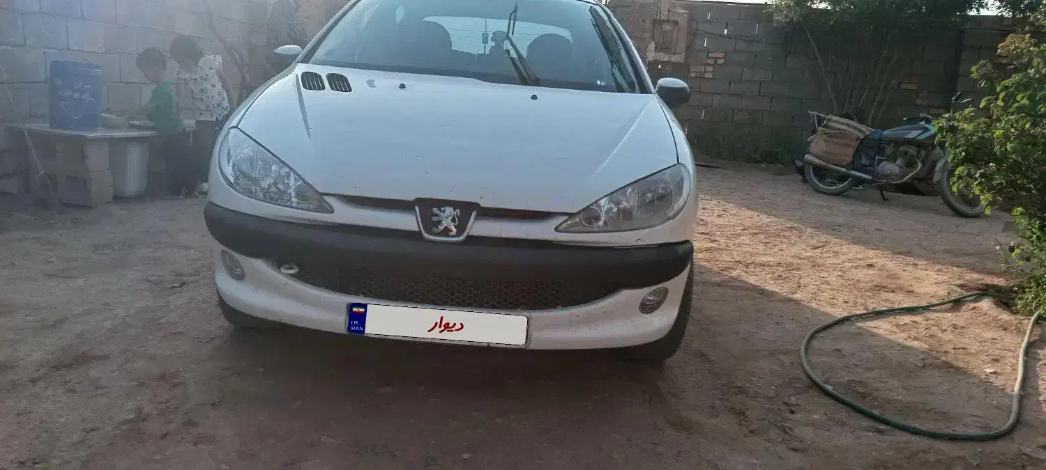پژو ۲۰۶ صندوق دار v8 - 1395