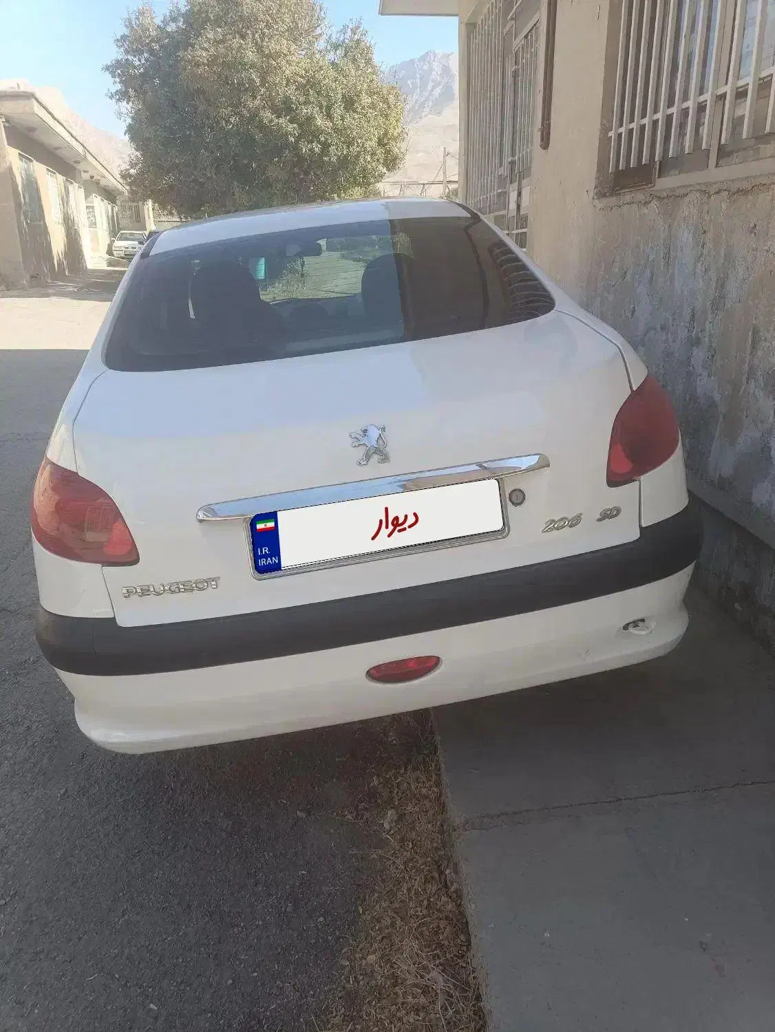 پژو ۲۰۶ صندوق دار v8 - 1396