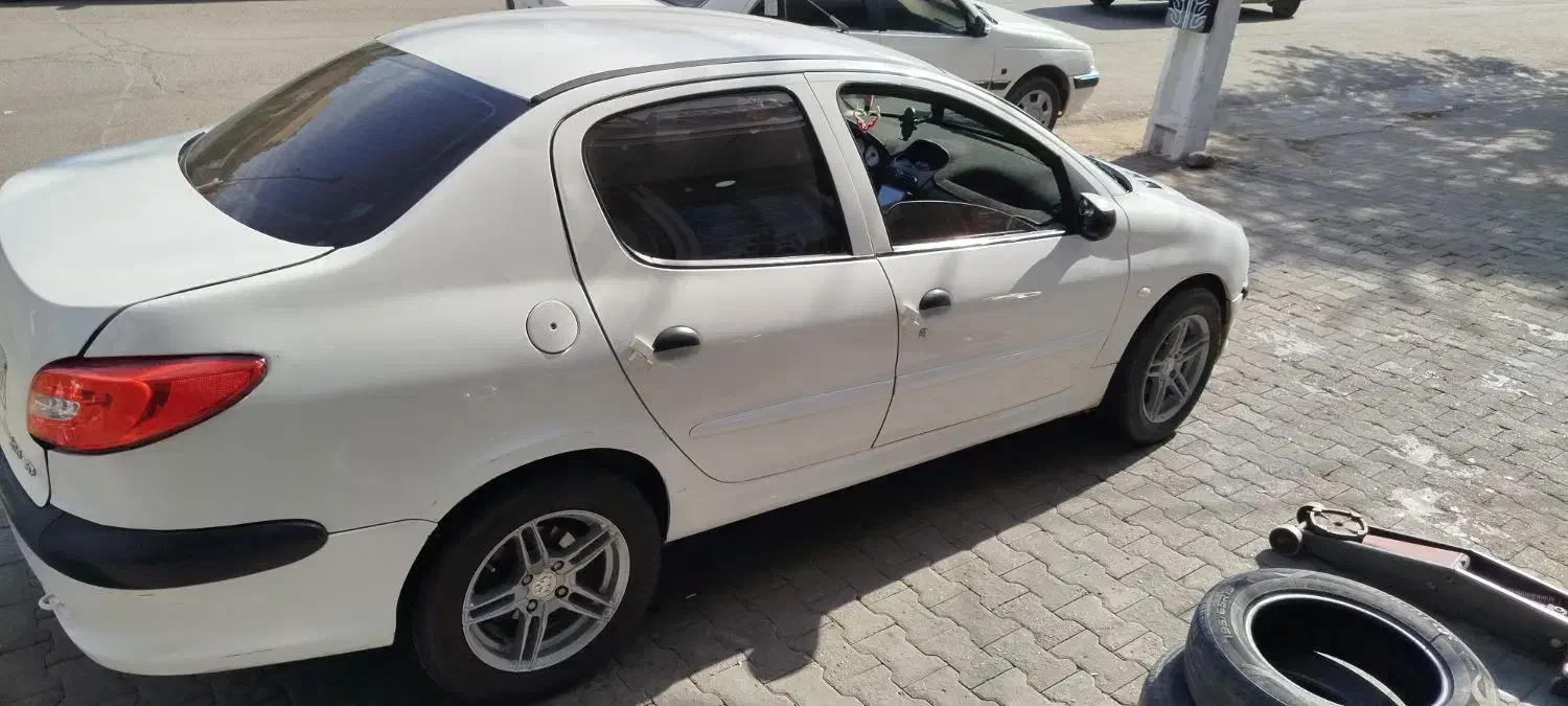 پژو ۲۰۶ صندوق دار v8 - 1394