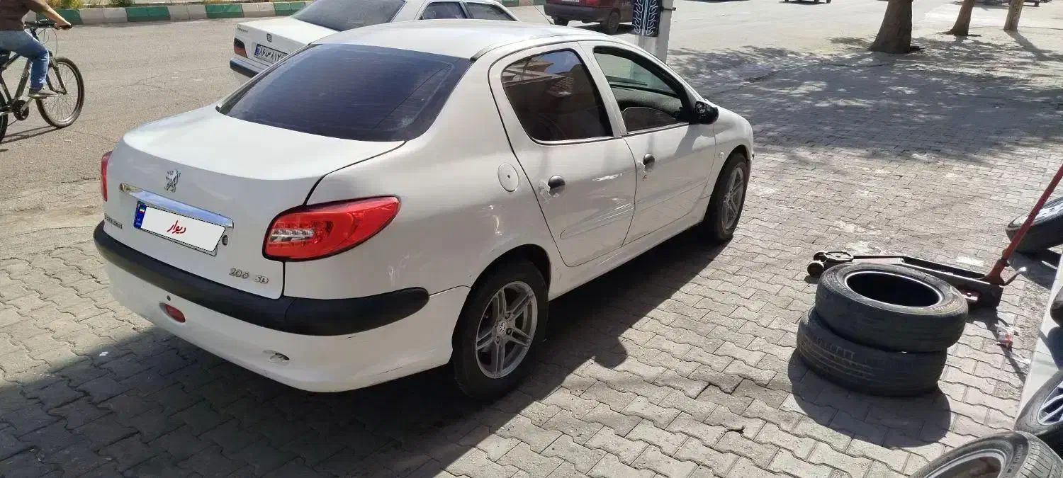 پژو ۲۰۶ صندوق دار v8 - 1394