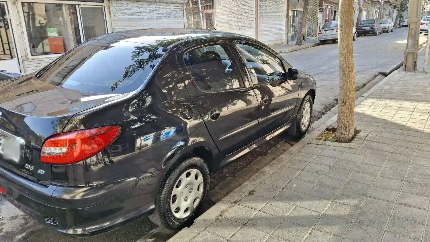 پژو ۲۰۶ صندوق دار v8 - 1397